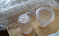 Packing cup for glass bottle unloading